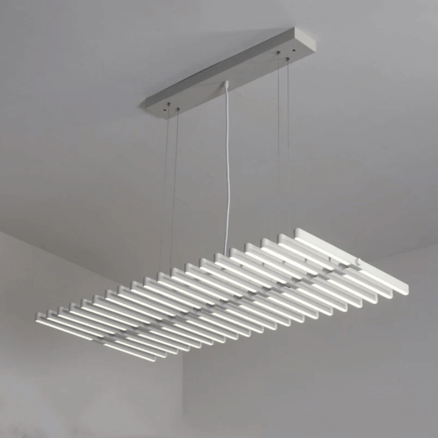 Modern pendant light fixture hanging from a ceiling