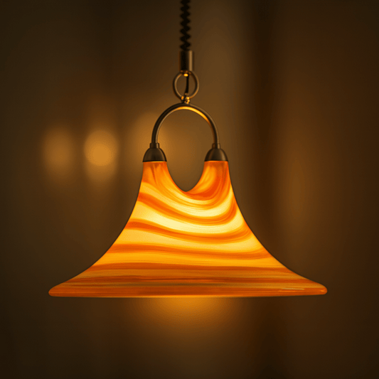 Ornate pendant light with a warm glow against a dark background