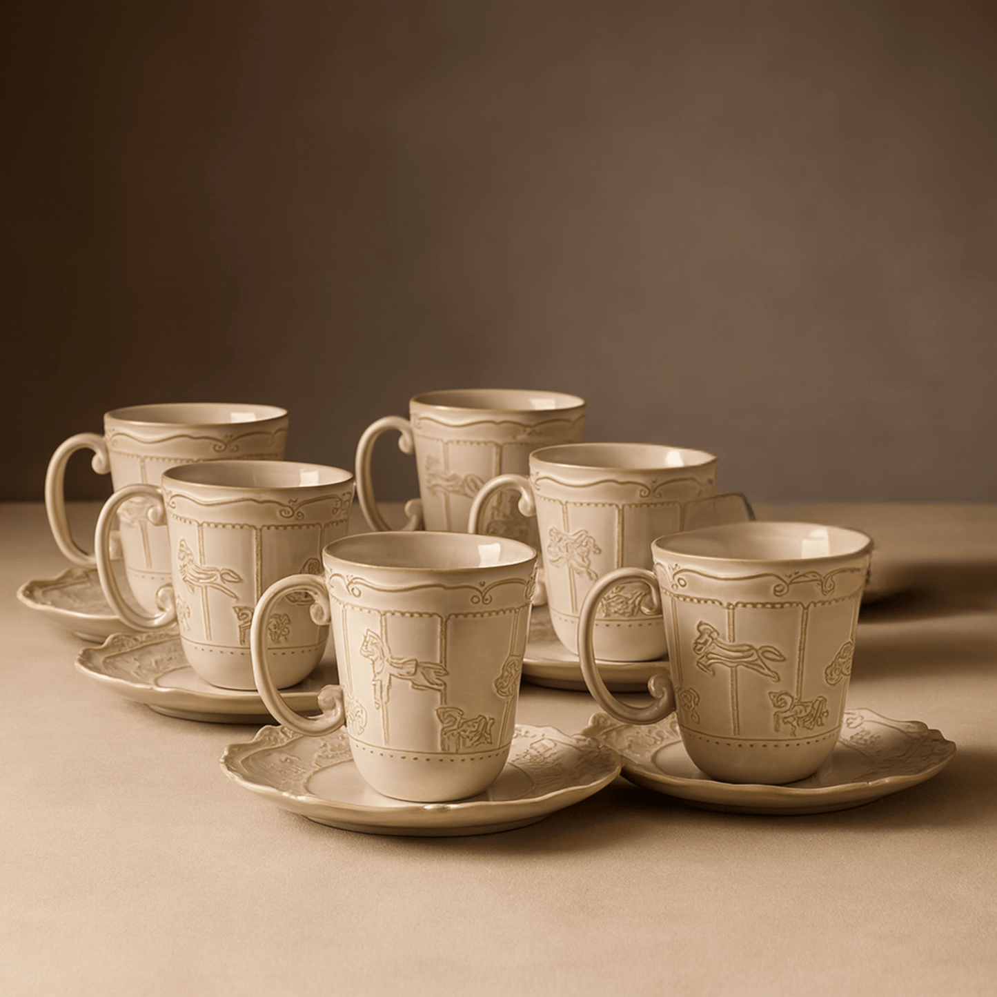 Set of ceramic cups and saucers with intricate designs on a brown background