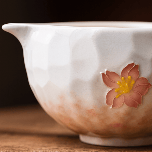 Ceramic bowl with a floral design on a wooden surface