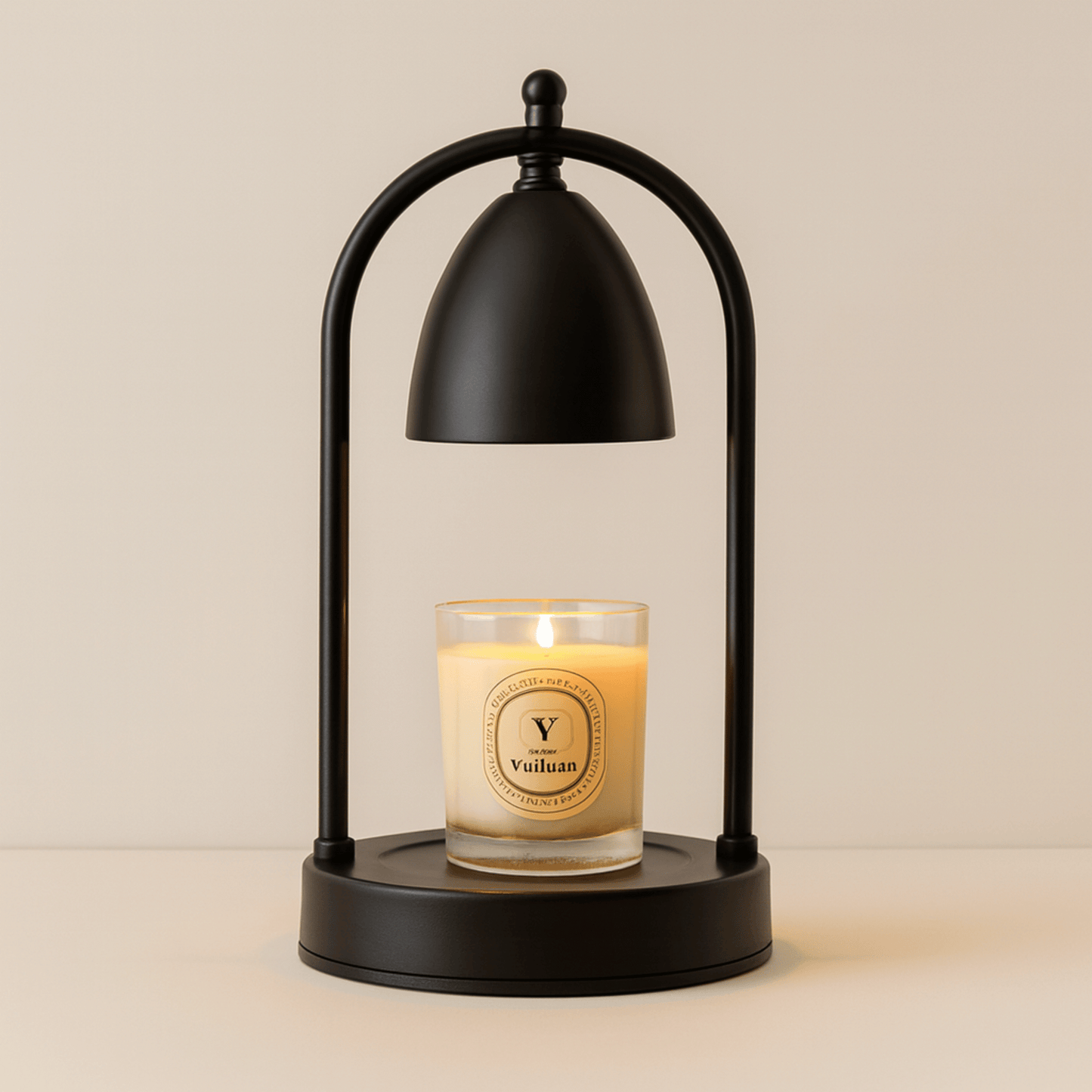 Candle with a black lampshade on a beige background