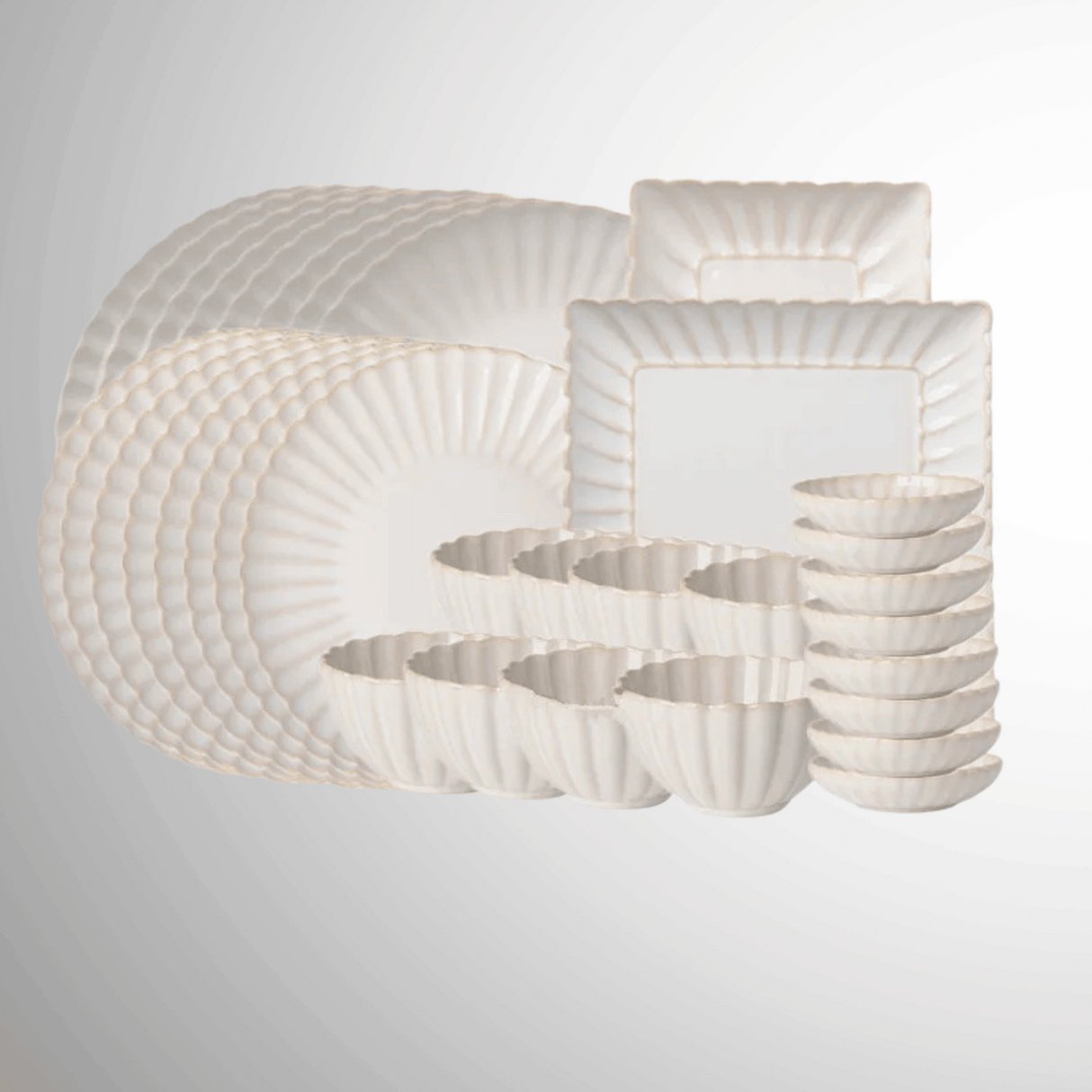 Set of white ceramic plates with textured design on a light gray background