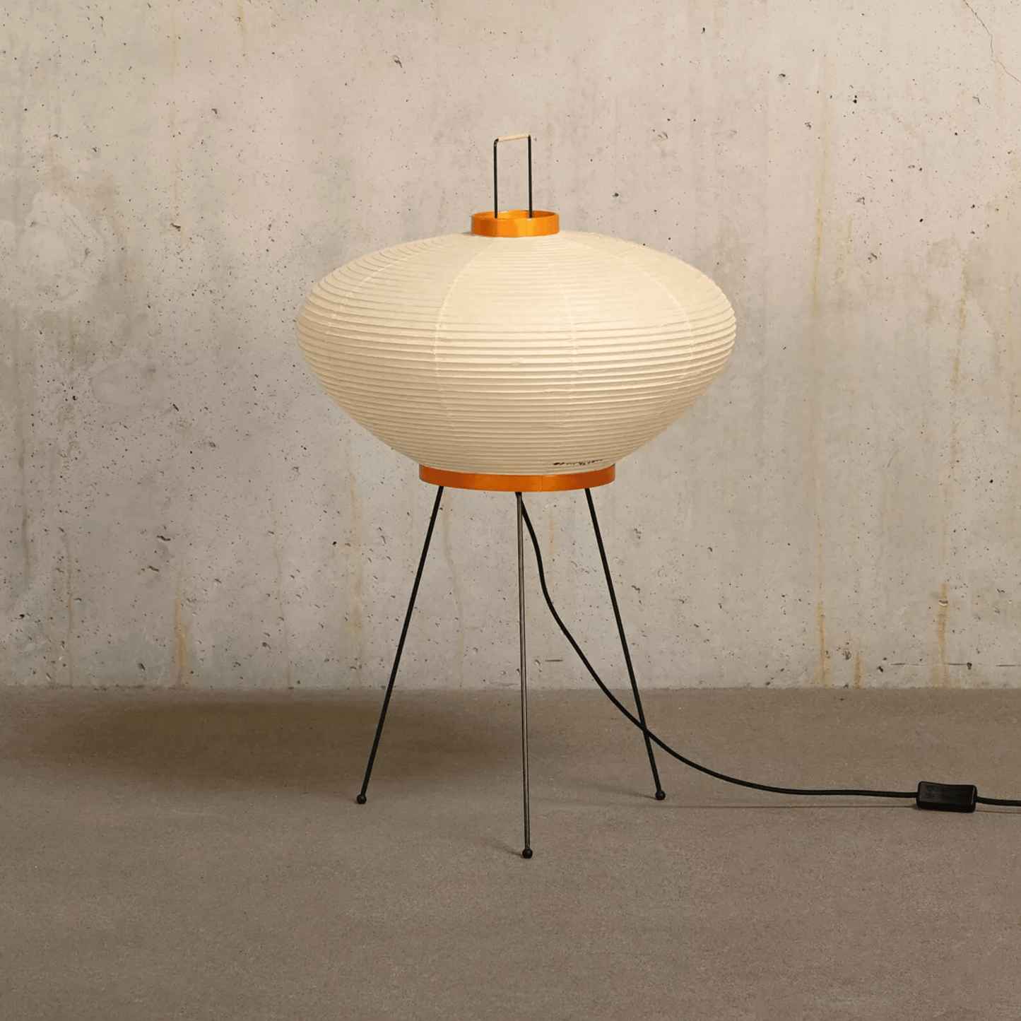 Modern floor lamp with ribbed design on a textured wall background