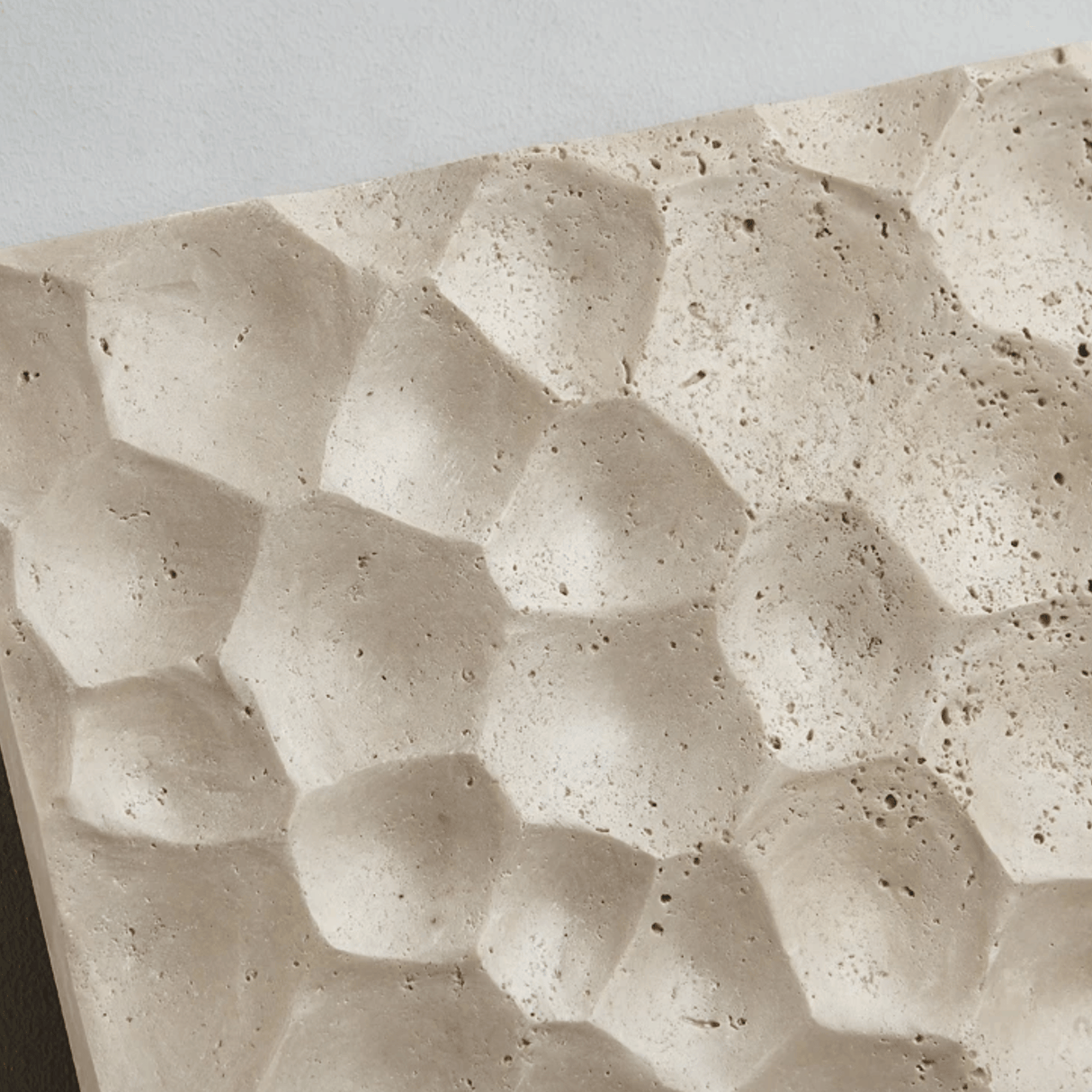 Close-up of textured stone surface with wavy pattern