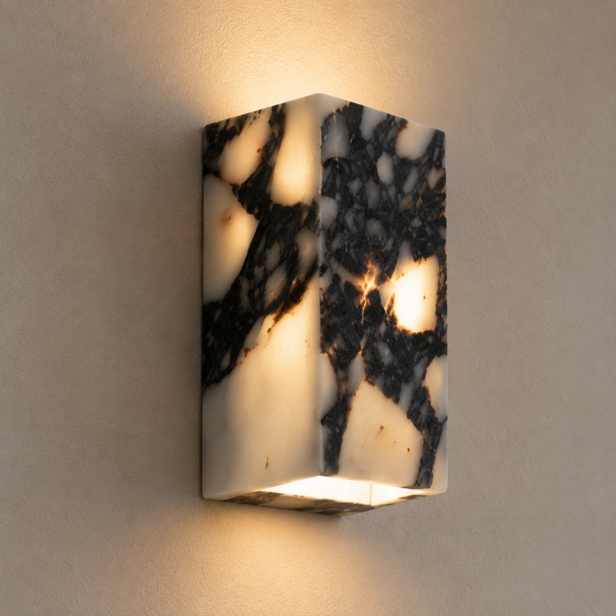 Marble-patterned wall sconce on a neutral wall