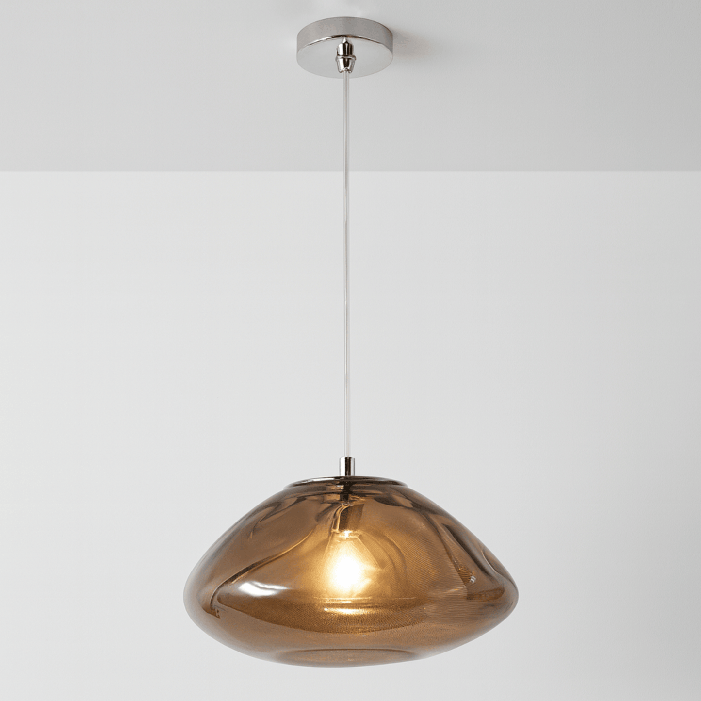 Bronze pendant light on a white background