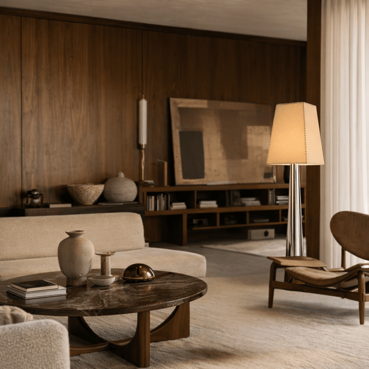 Modern living room with wooden coffee table, beige sofa, and lamp.