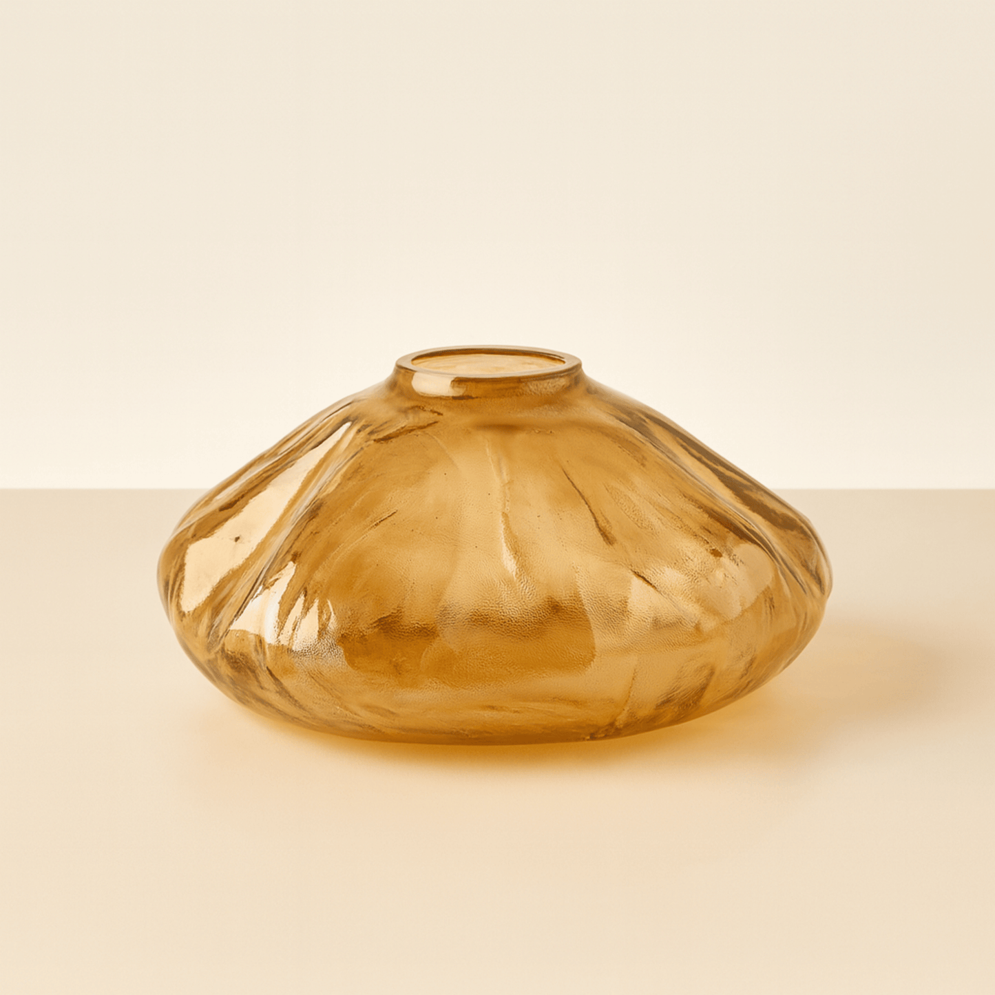 Brown glass vase on a beige background