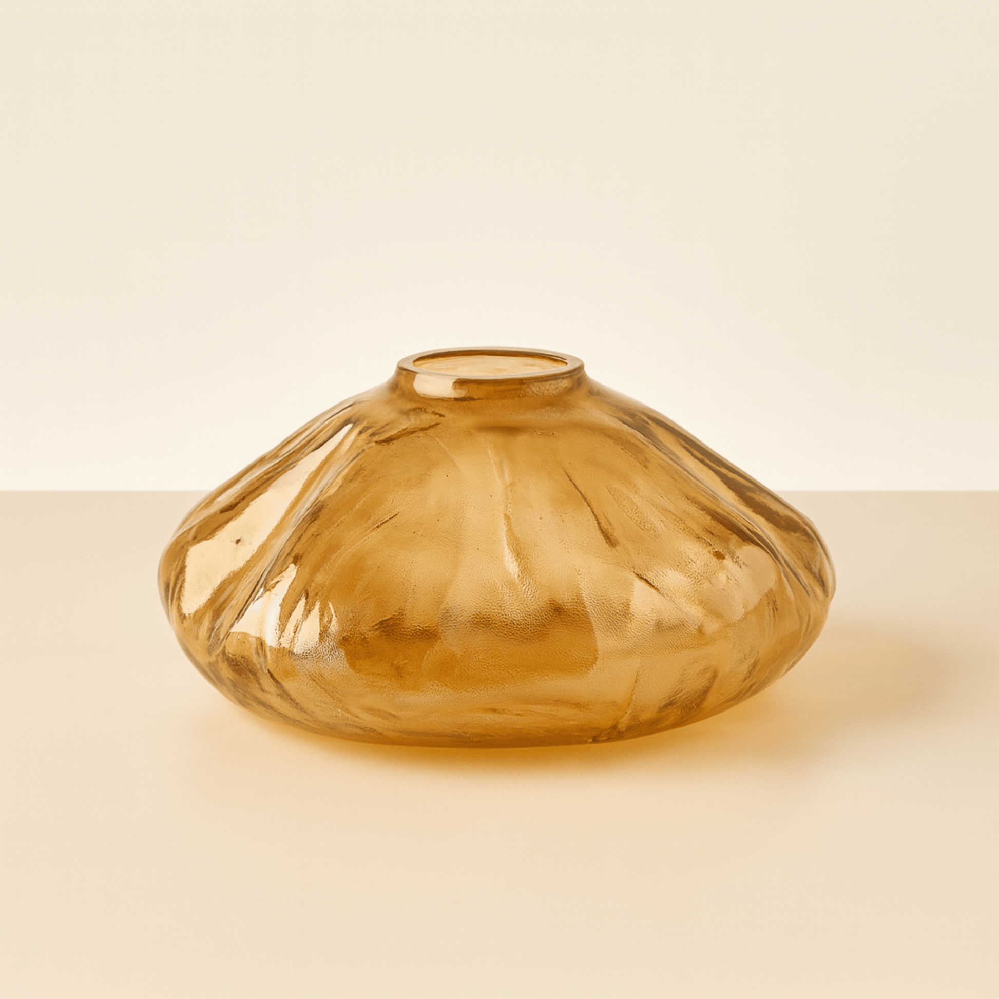 Brown glass vase on a beige background