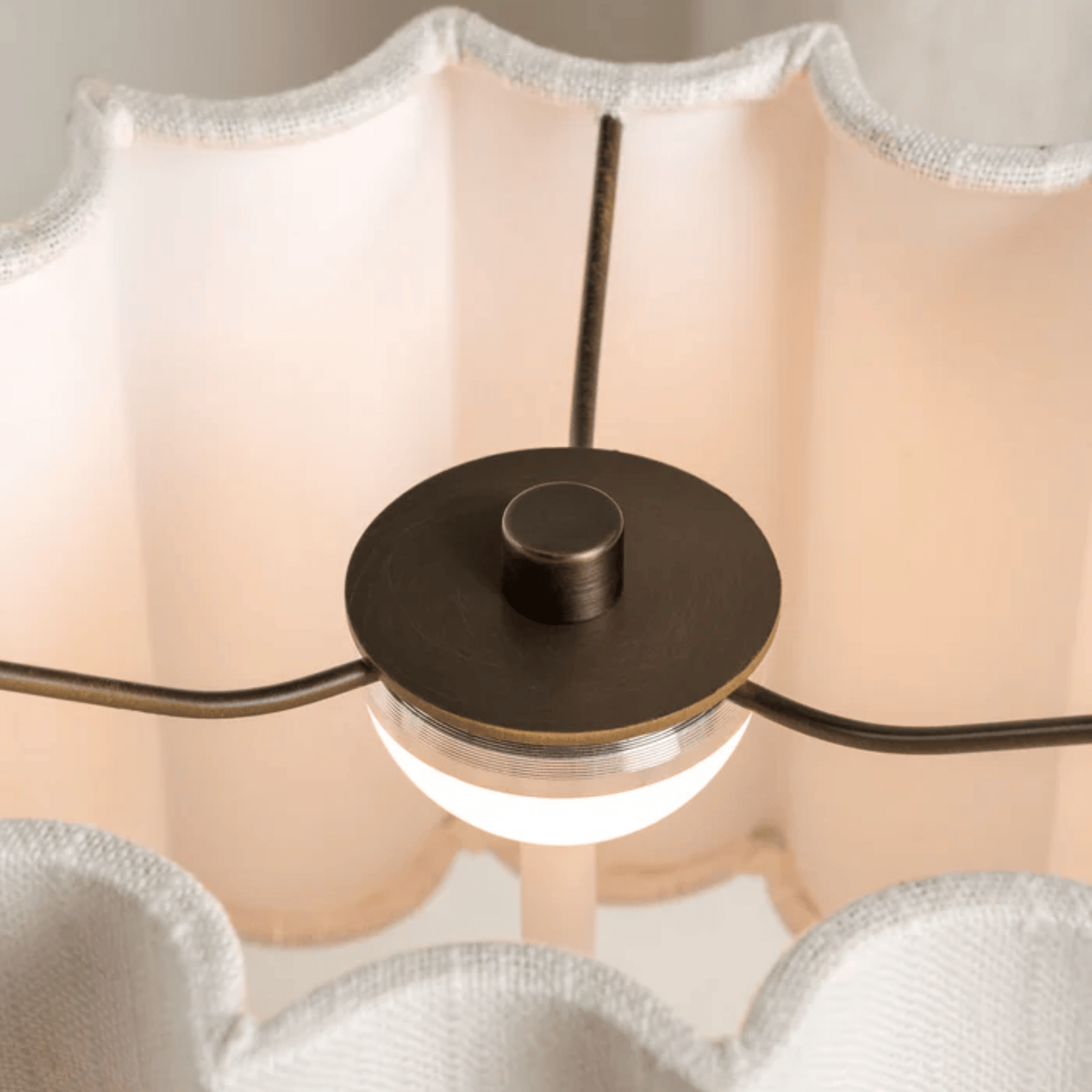 Close-up of a ceiling light fixture with a soft focus background