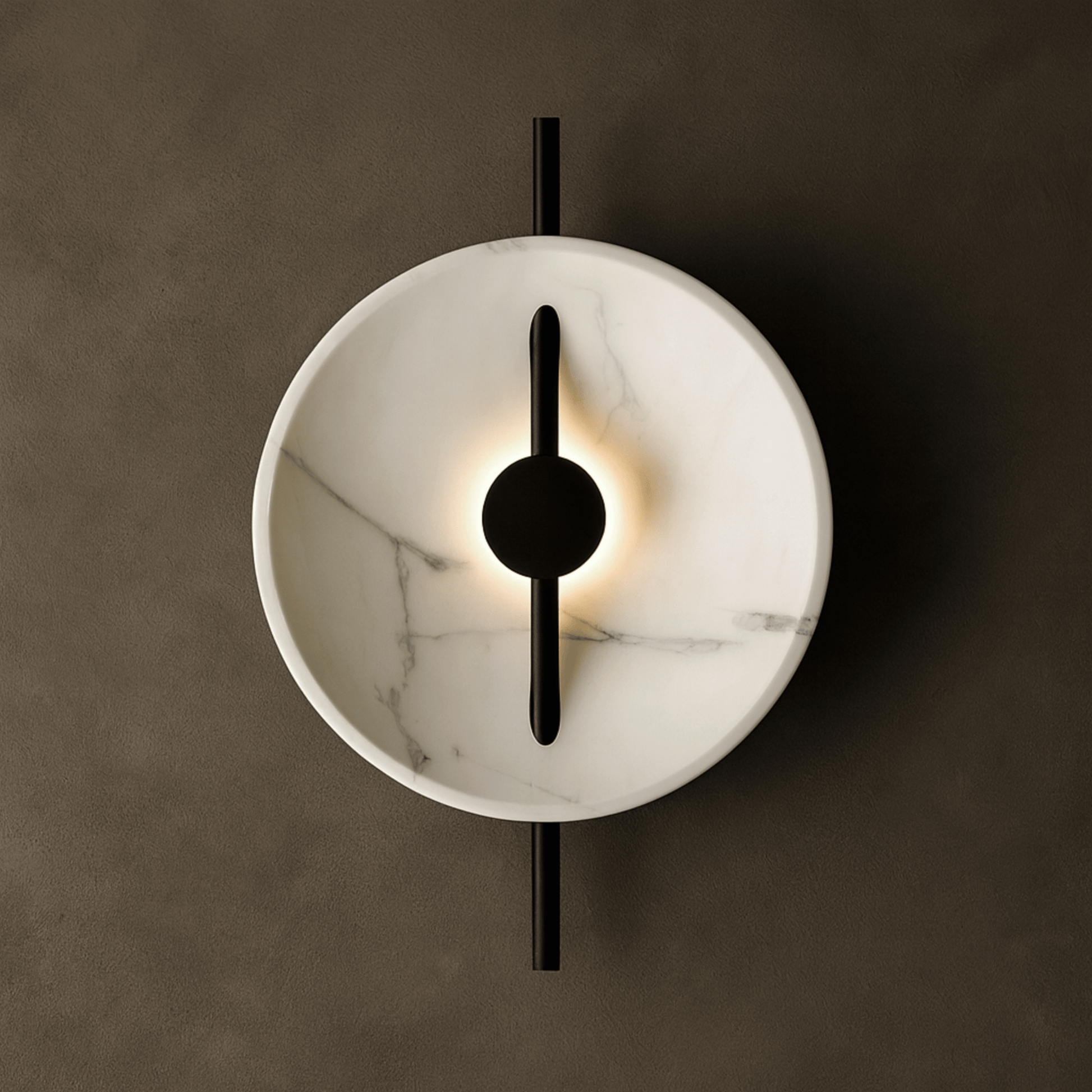 Modern wall light fixture with marble-like finish and black accents on a dark background