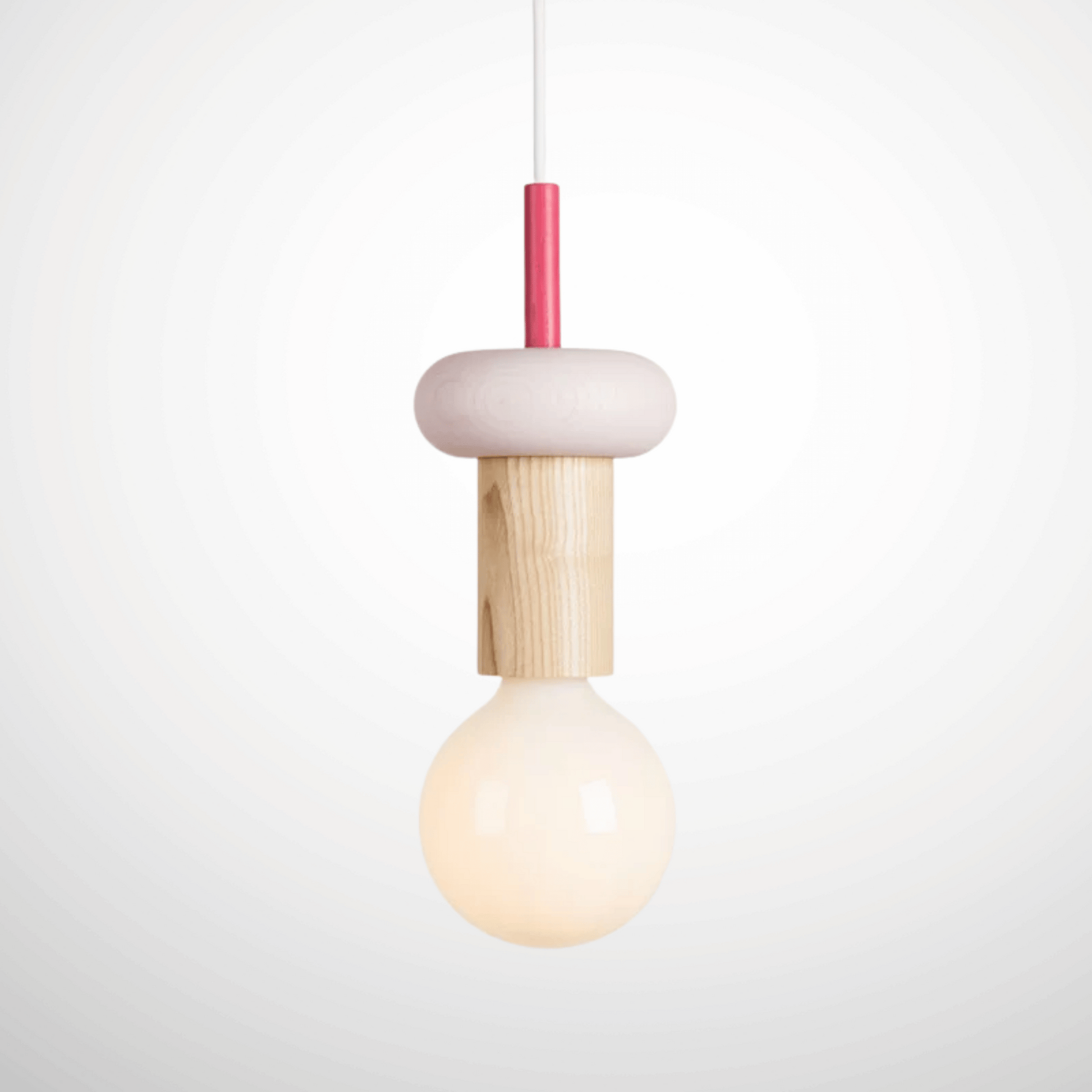 Minimalist pendant light with wooden and pink design on a white background