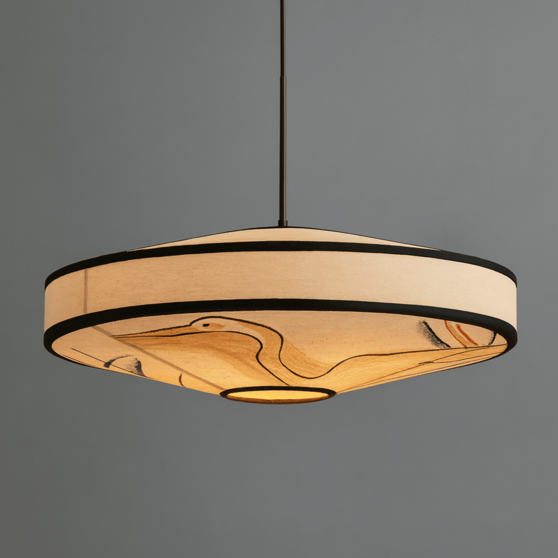 Round pendant light with marble-like design on a gray background