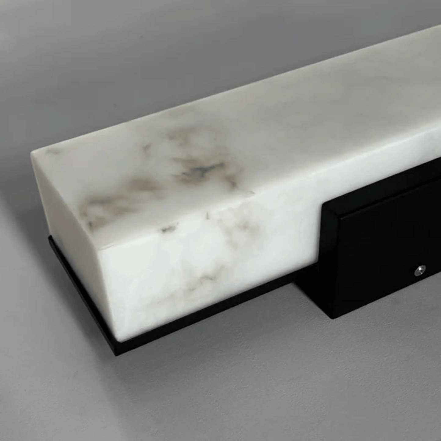 Marble-patterned light fixture on a gray background