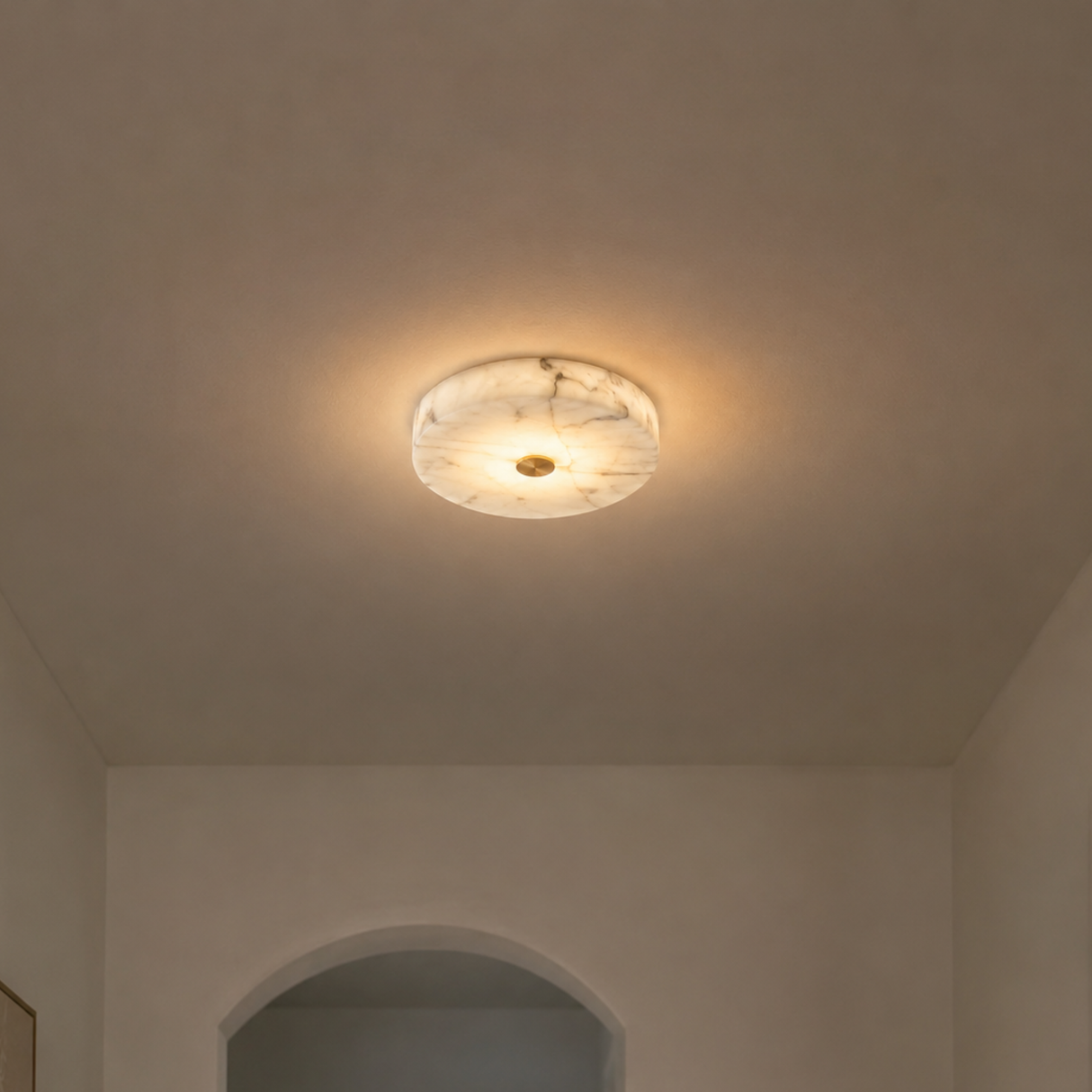 Round ceiling light fixture on a neutral ceiling