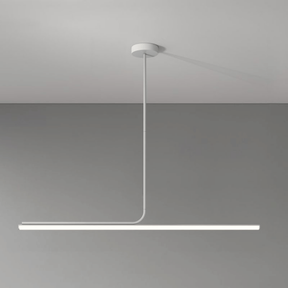 Modern pendant light fixture on a gray background