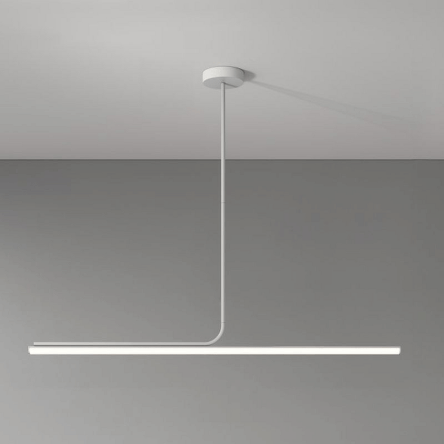 Modern pendant light fixture on a gray background