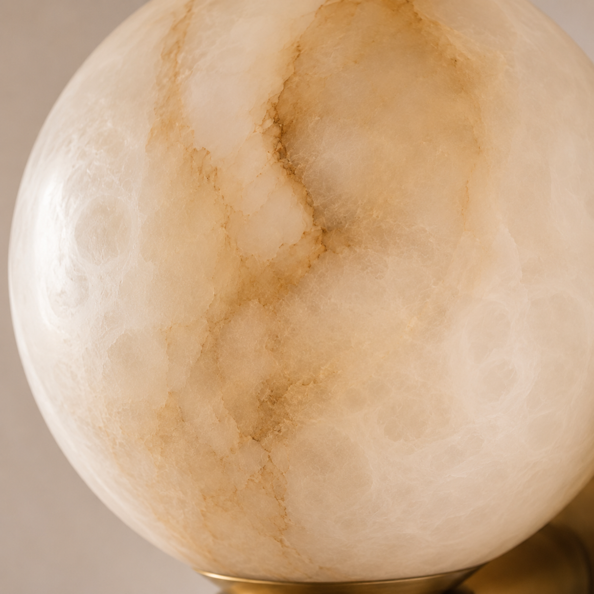 Close-up of a marble-textured lamp with a beige and brown color scheme.