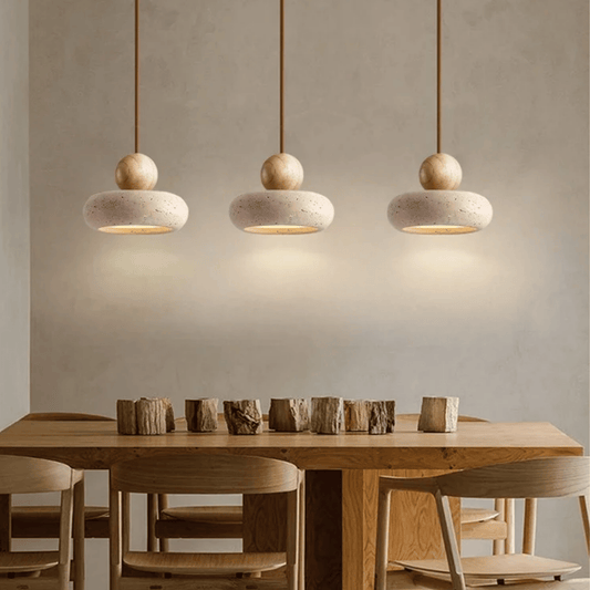 Three Sunlace Agate Pendant Lamp LEDs suspended over a wooden dining set, enhancing the space with natural stone charm and soft LED glow.