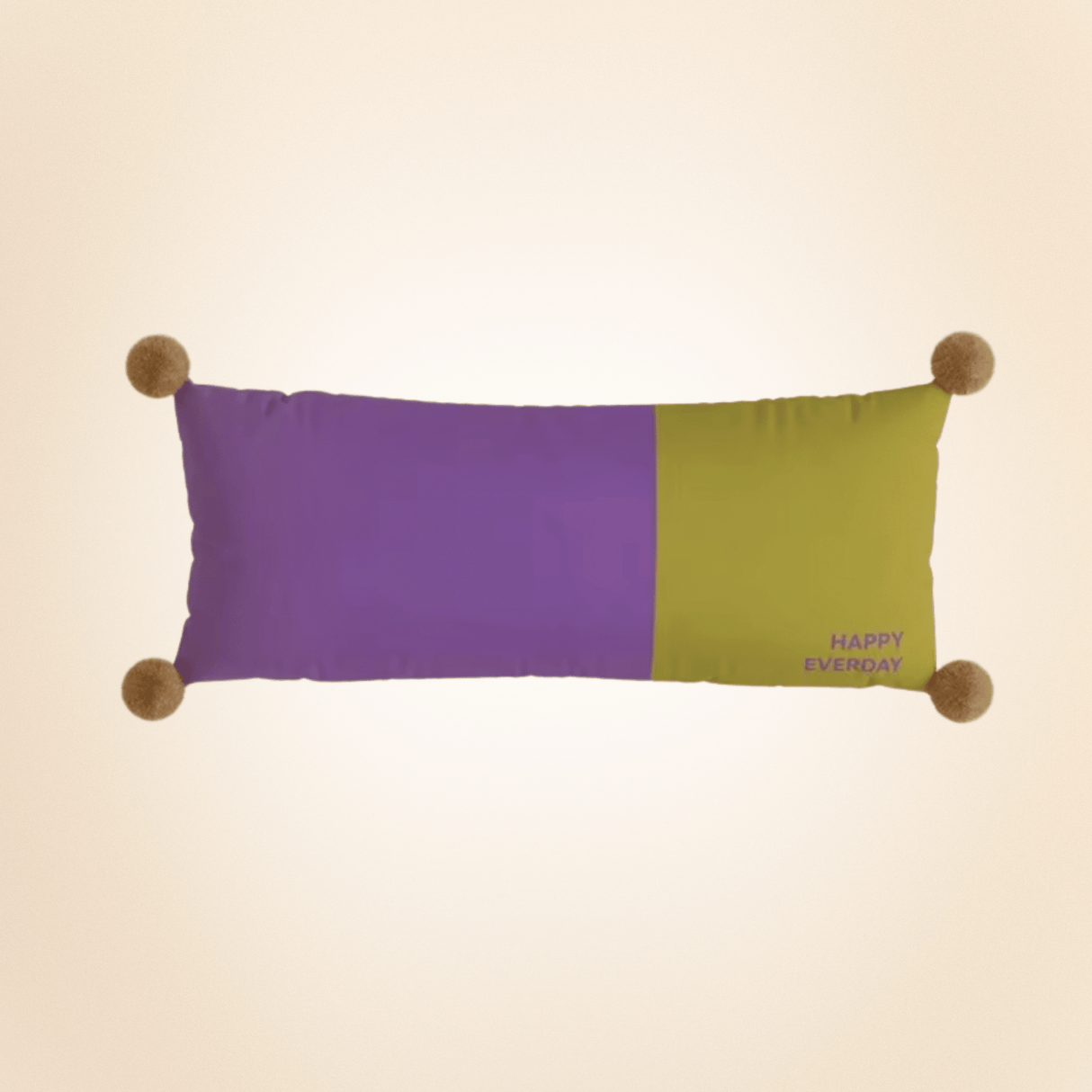 Color-blocked pillow with purple and green sections on a beige background