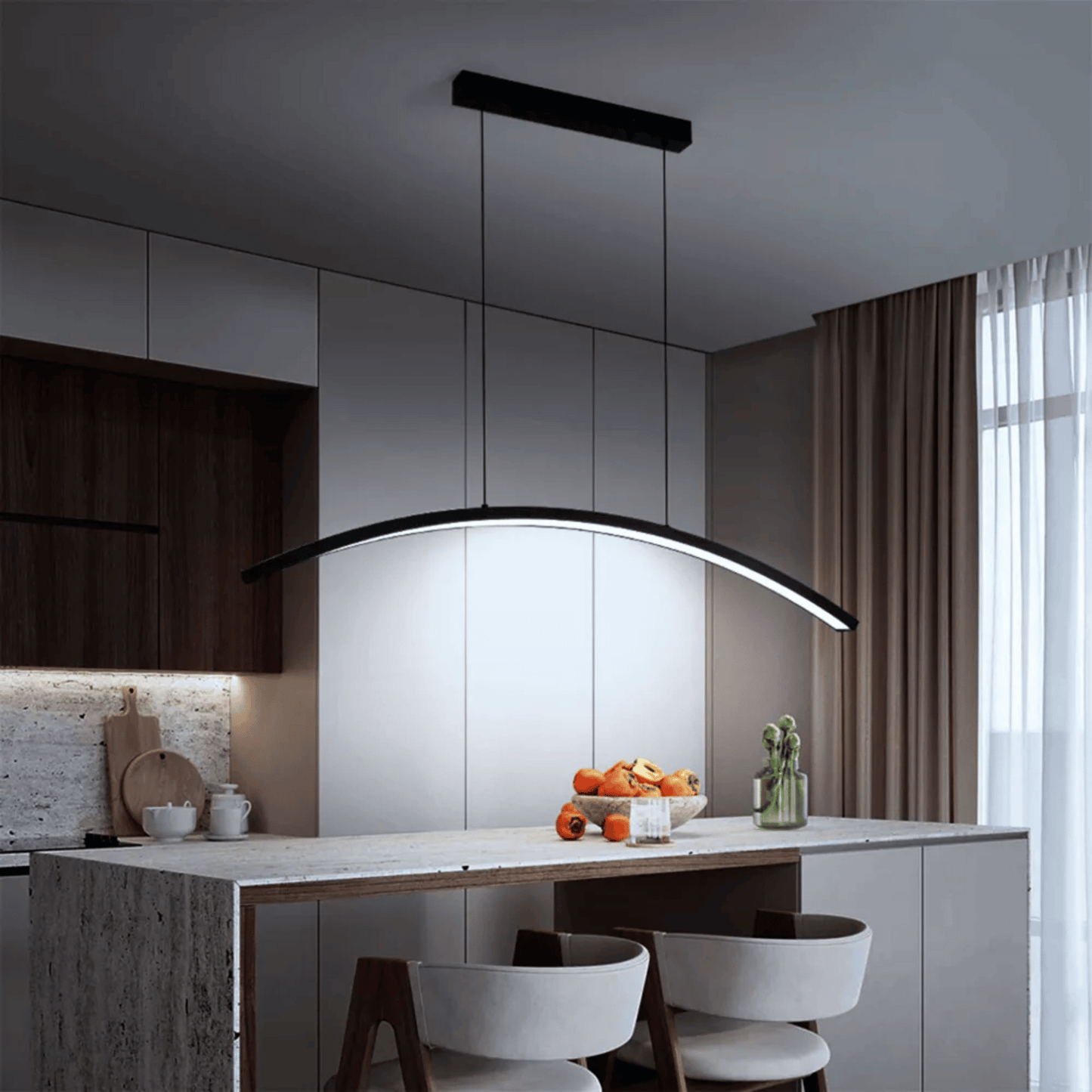 Modern kitchen with a black pendant light fixture.