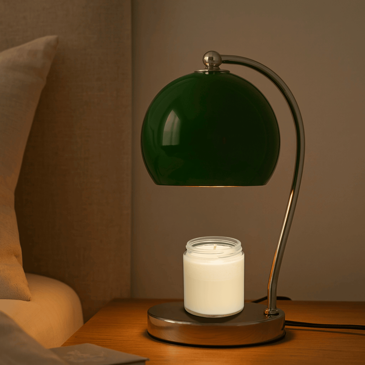 Table lamp with white shade and metal base on a wooden surface.