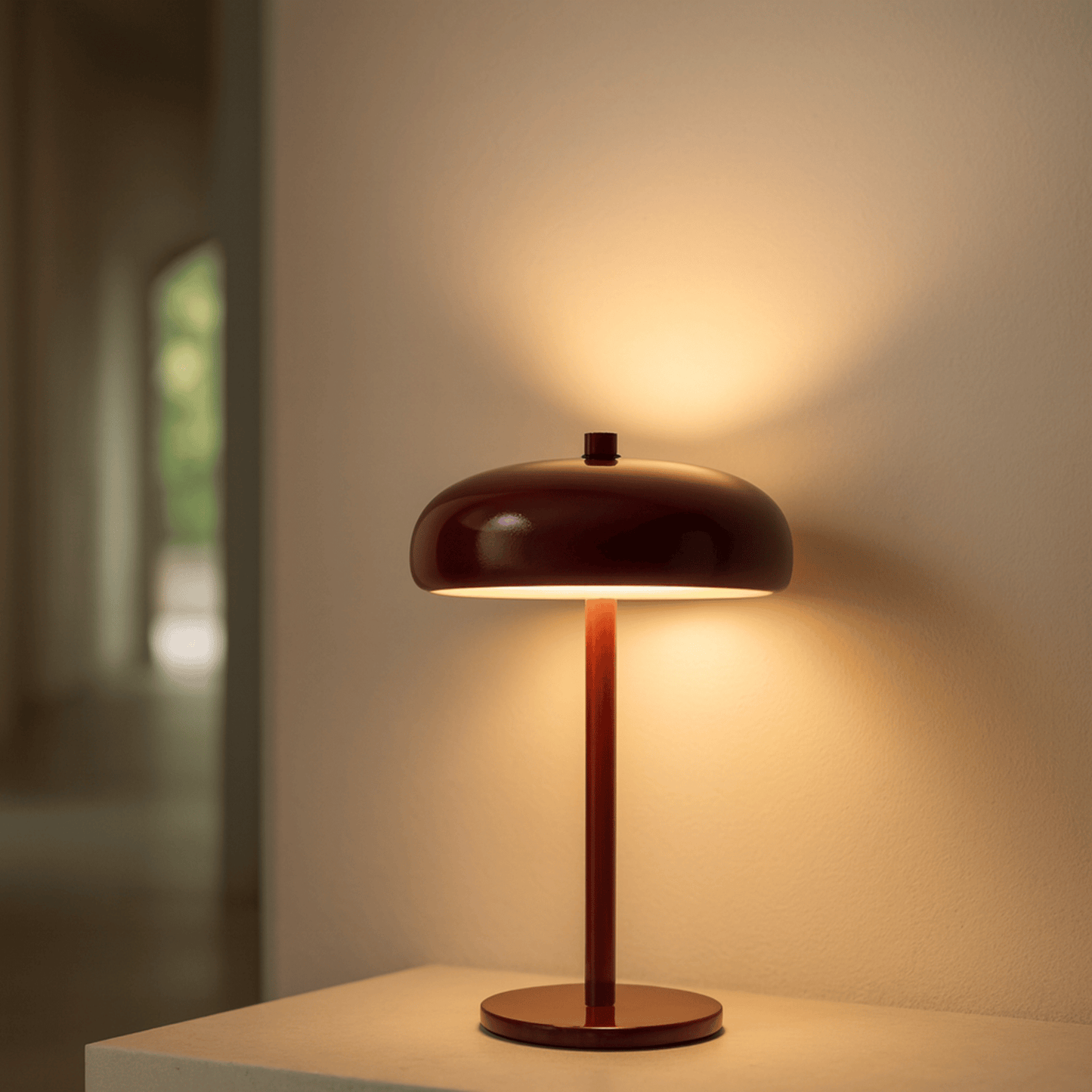 Table lamp with a dark brown shade and wooden base on a neutral background