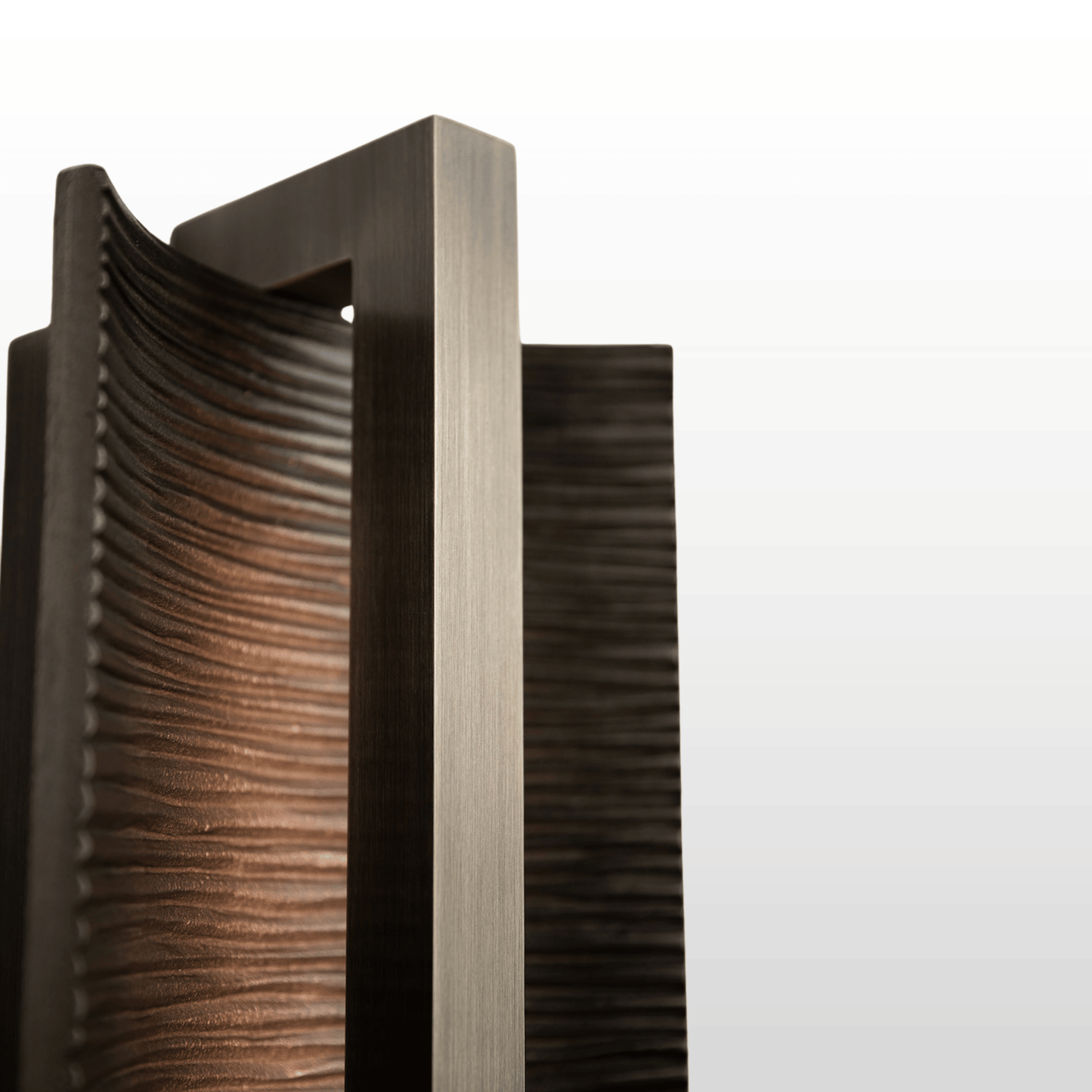 Decorative wall light with wavy wooden design on a white background