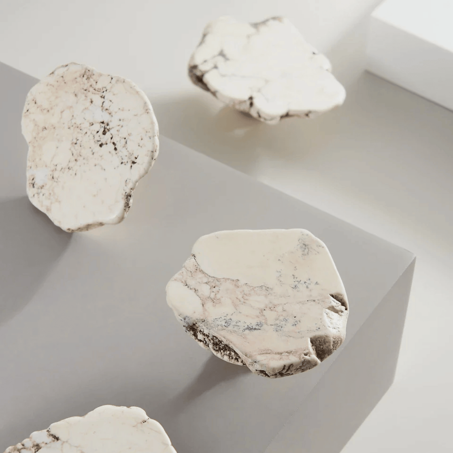 Close-up of textured stone-like cookies on a light background