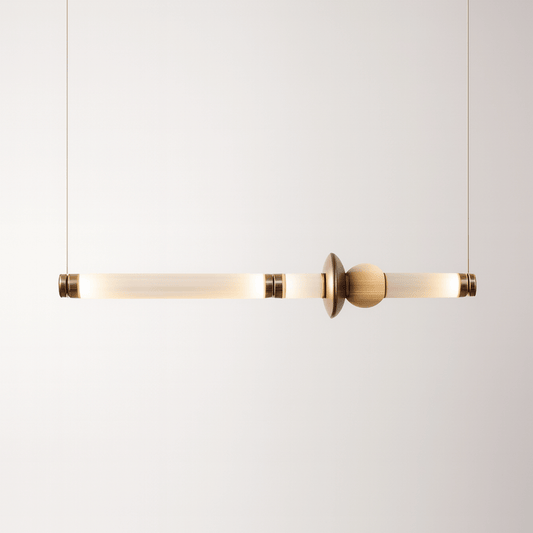 Modern pendant light with gold finish on a white background