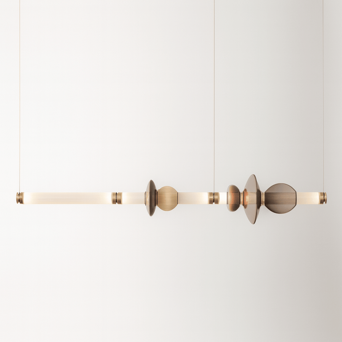 Modern pendant light with geometric design on a white background