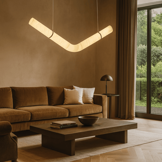 Modern living room with brown sofa, coffee table, and pendant light.