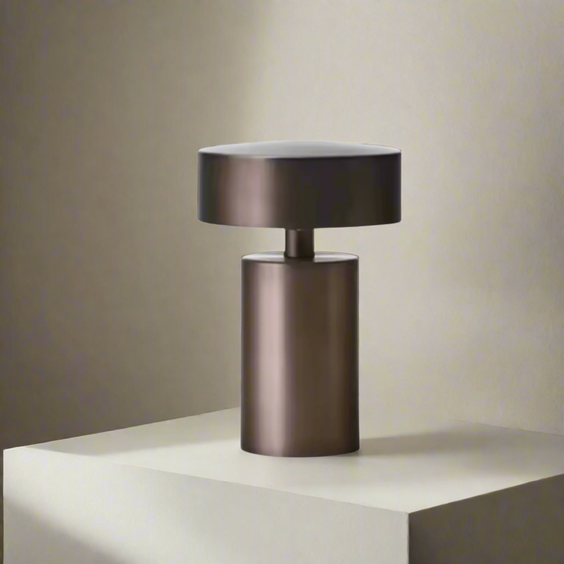 Bronze-colored cylindrical object on a white background
