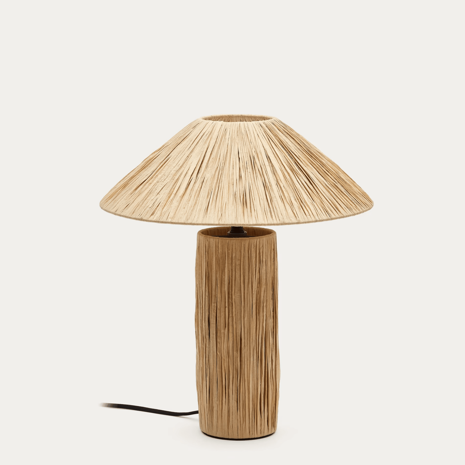 Wooden table lamp with a textured design on a white background