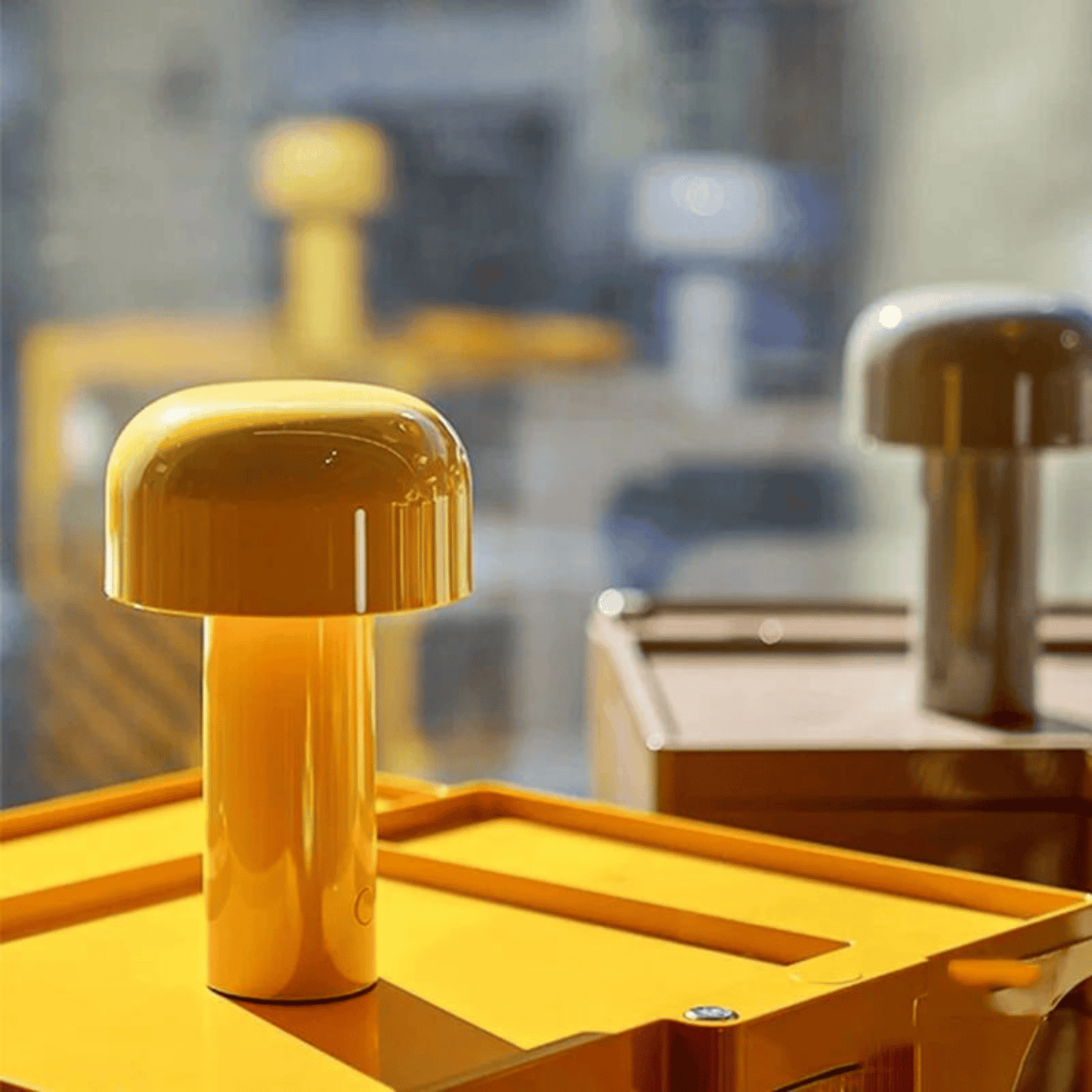 Yellow lamp on a wooden surface with a blurred background