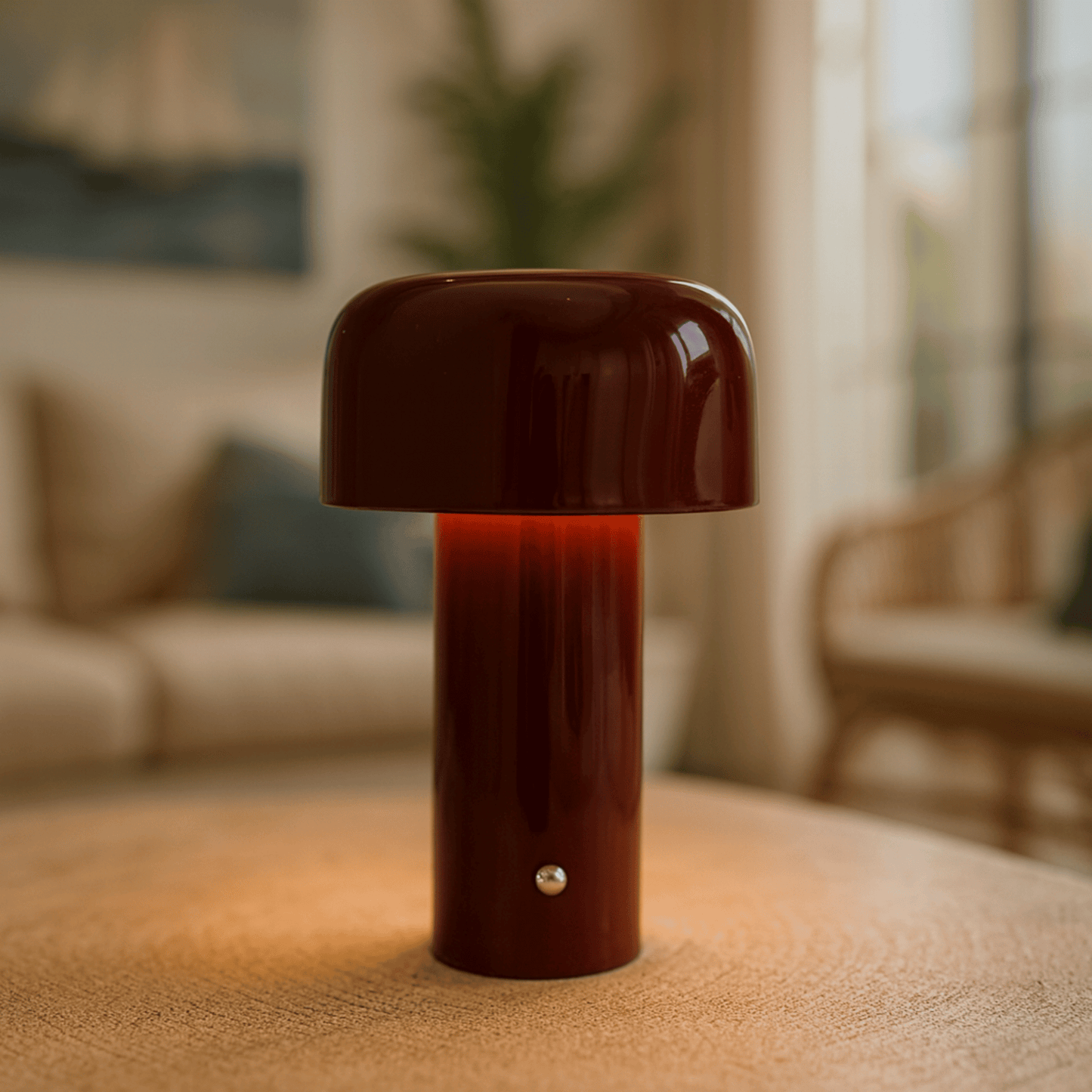 Mushroom-shaped lamp on a textured surface with a blurred indoor background