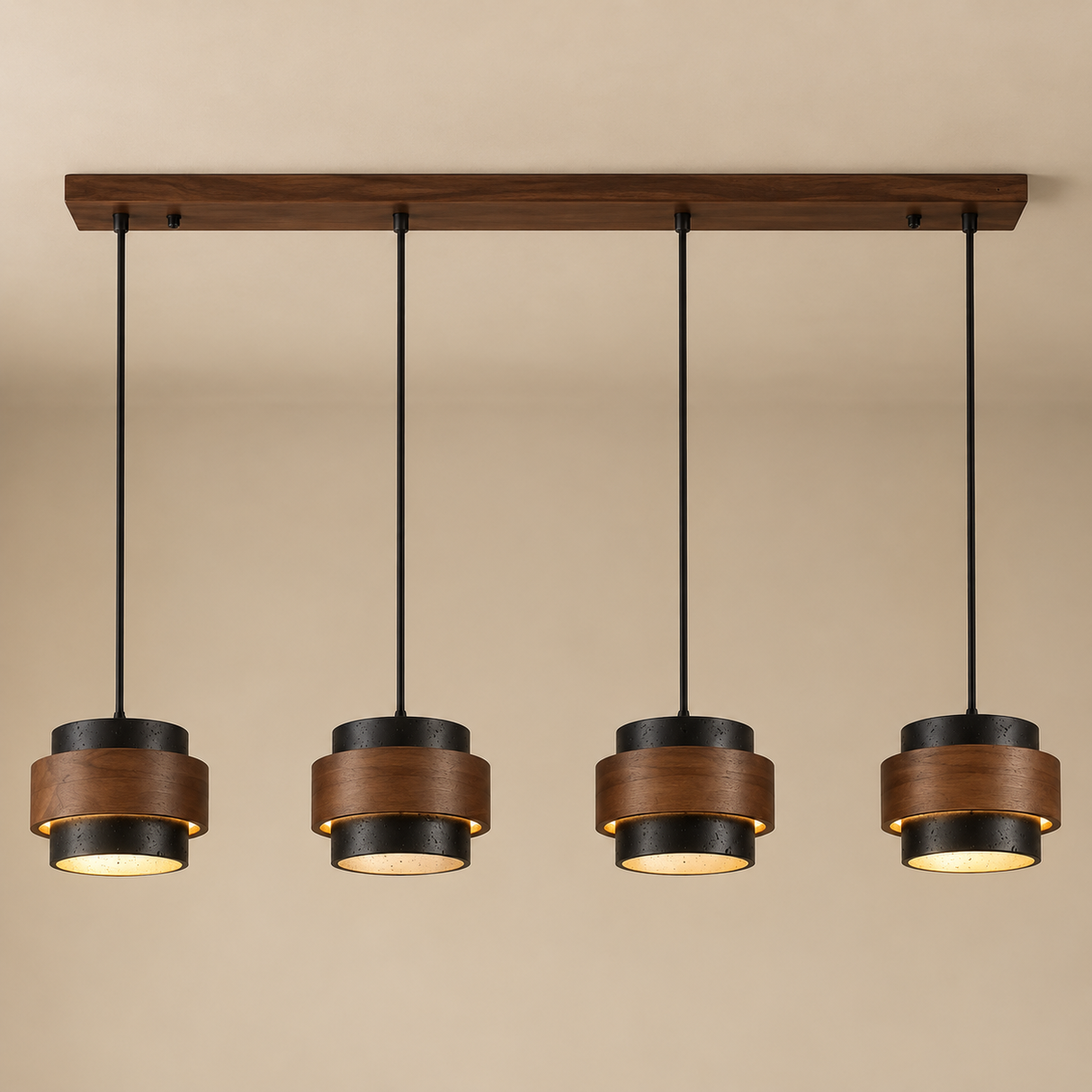 A four-light linear pendant ceiling fixture with dark wood shades, black metal accents, and warm glowing lights, suspended from a horizontal wooden bar against a beige wall.