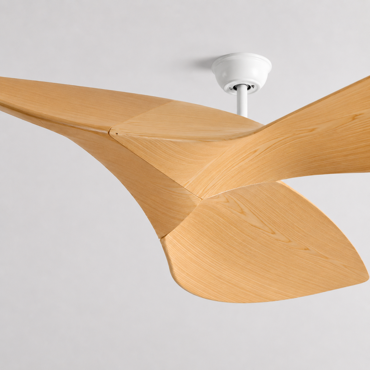 Ceiling fan with wooden blades on a gray background