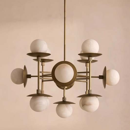 Modern chandelier with spherical lights on a beige background