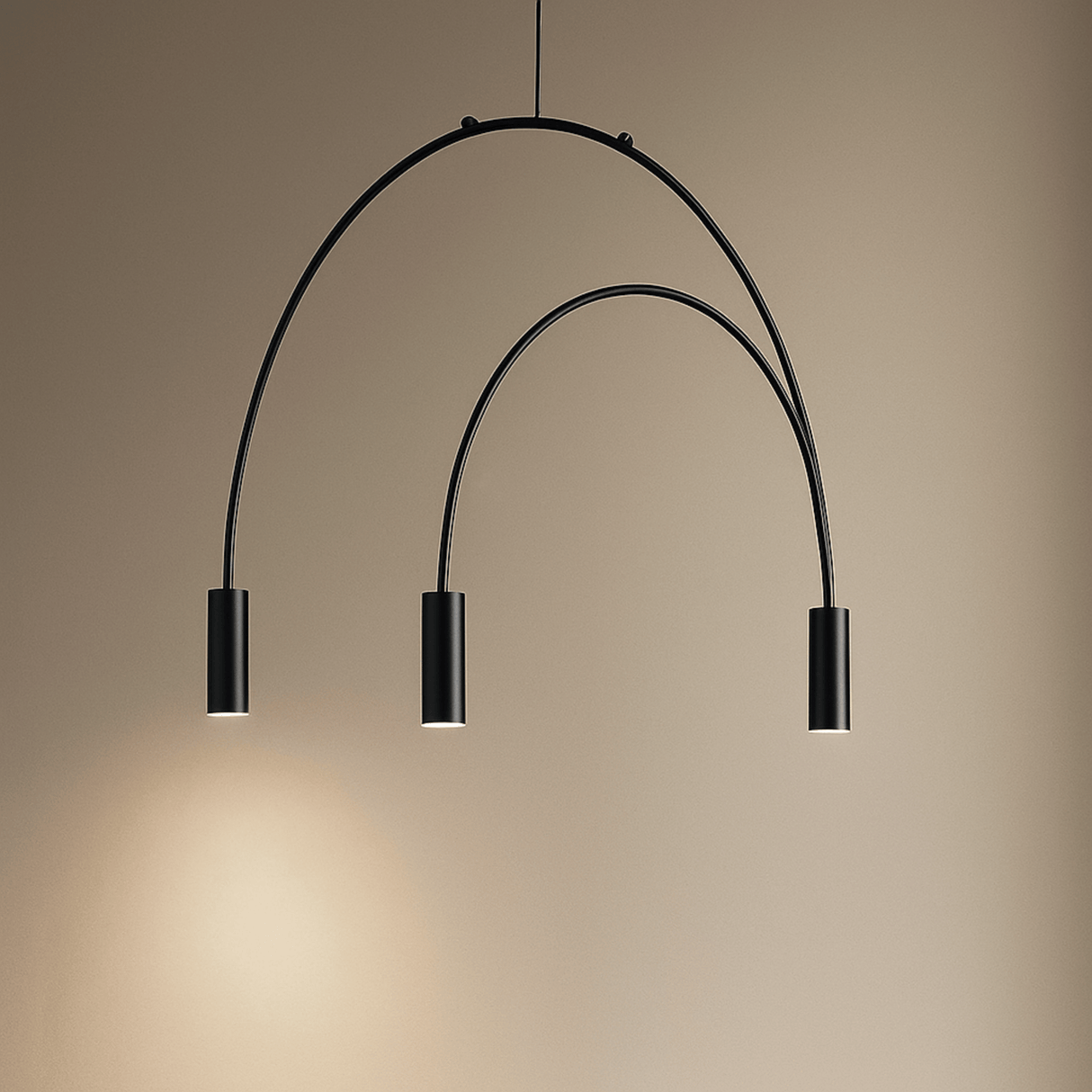 Modern black pendant light with three curved arms on a beige background