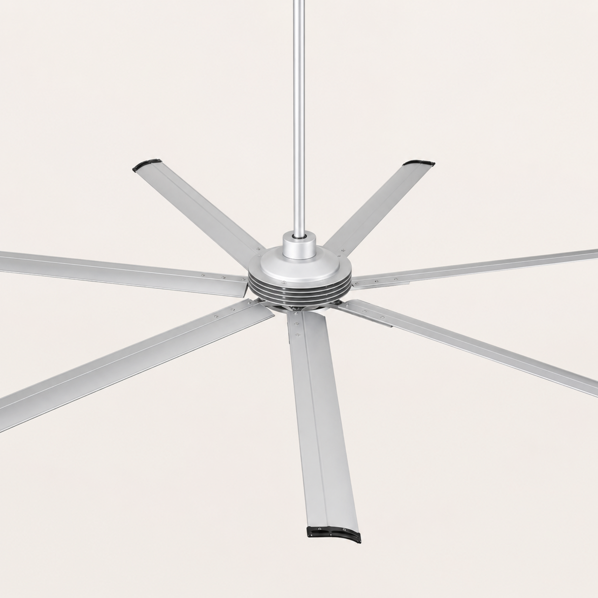 Ceiling fan with metallic finish on a white background