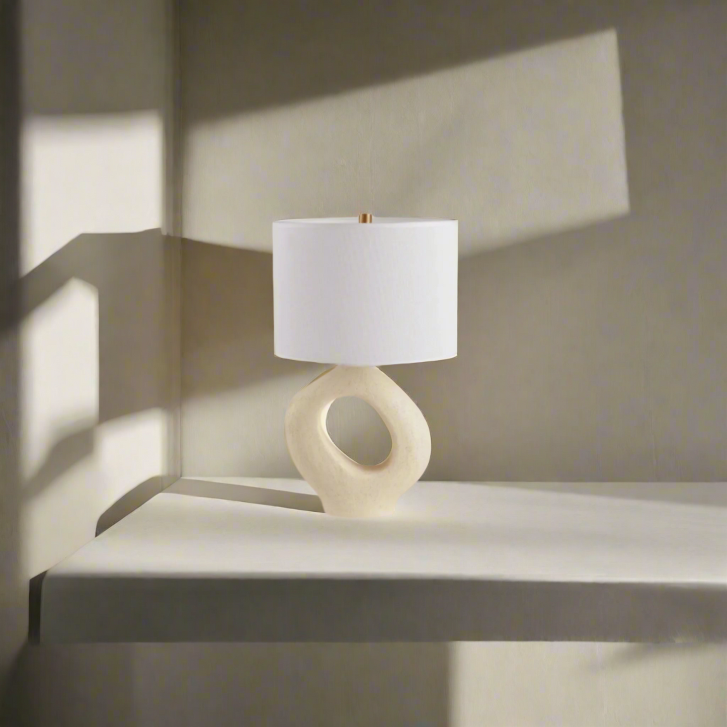 Modern Toki Glow Table Lamp combines artistic design with functionality, making it a perfect addition to your bedroom or living room. Beige & White
