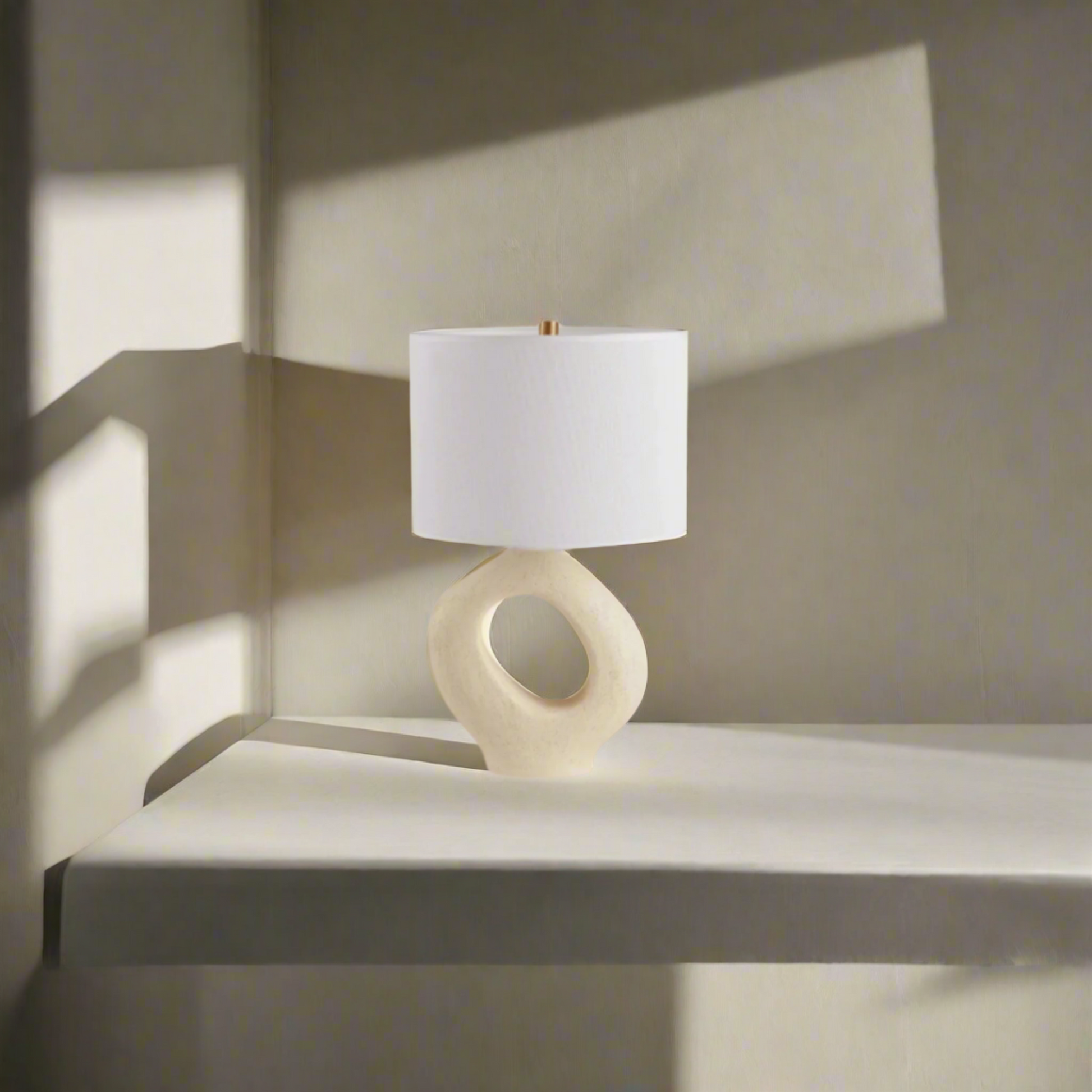 Modern Toki Glow Table Lamp combines artistic design with functionality, making it a perfect addition to your bedroom or living room. Beige & White