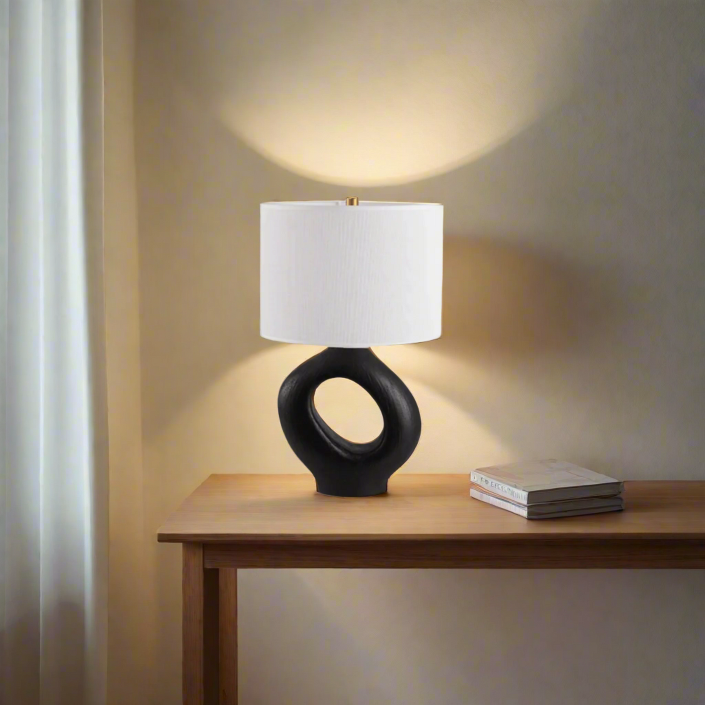 Modern Toki Glow Table Lamp combines artistic design with functionality, making it a perfect addition to your bedroom or living room. Black & White