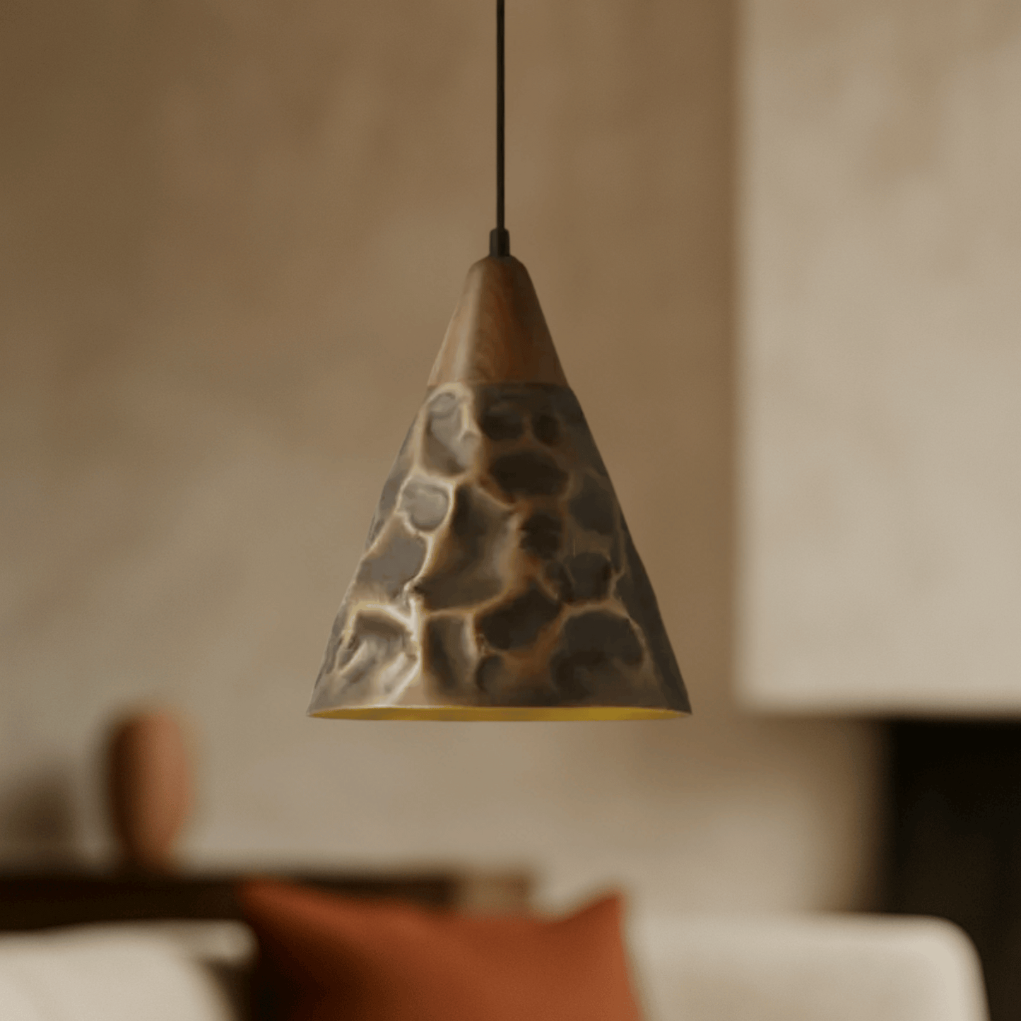 Elegant pendant light that combines vintage walnut and copper finishes in living room.