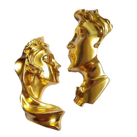 Pair of our Brass Couple Portrait Handle on  a white background