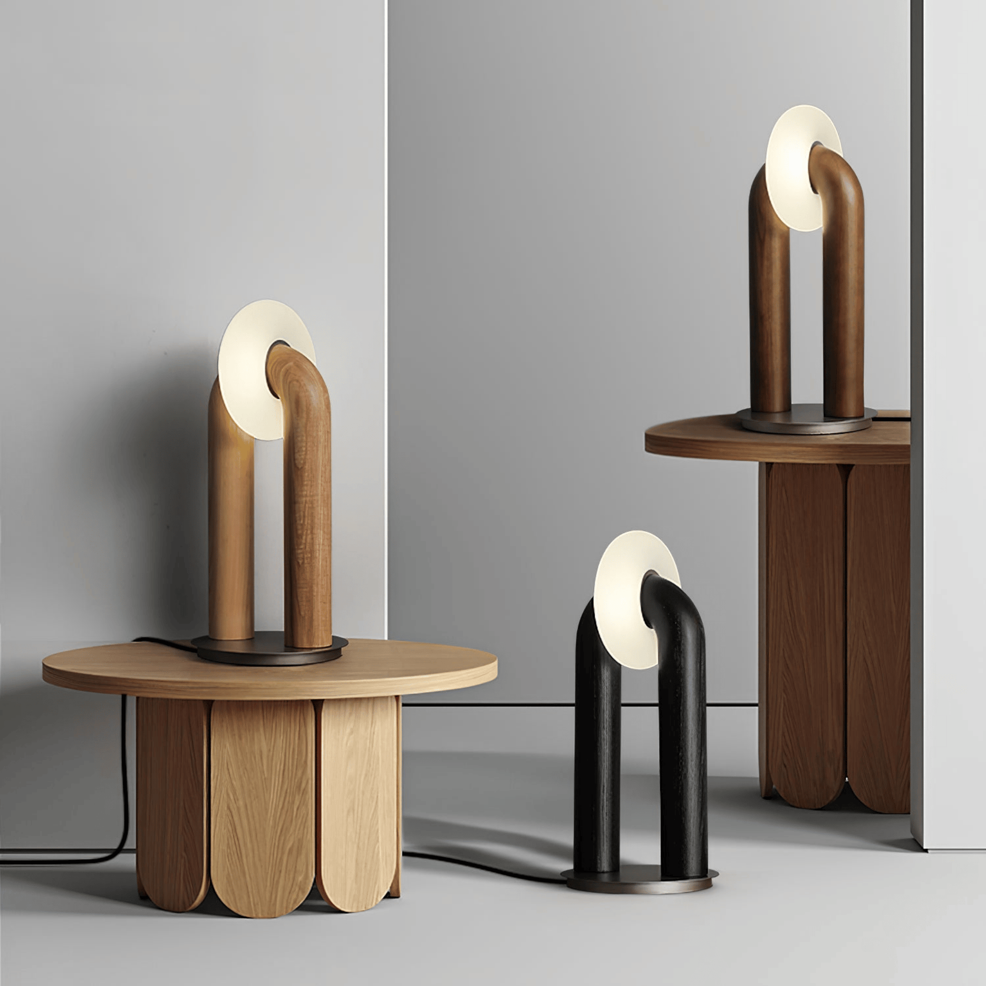 Modern table lamps with wooden and metal designs on a gray background