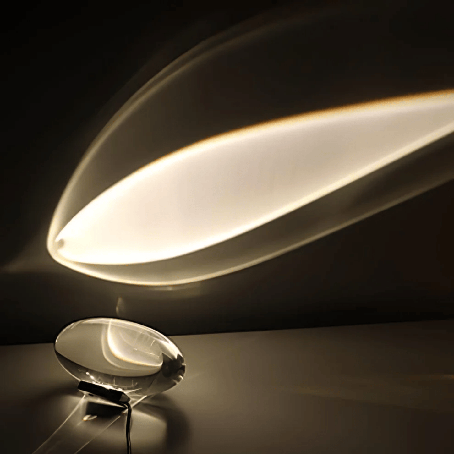 Modern ceiling light fixture on a dark background