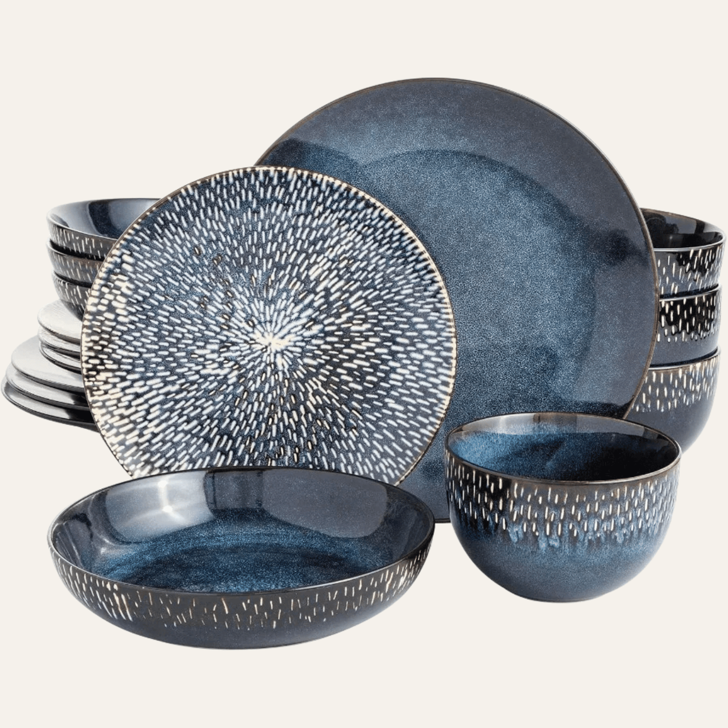 Set of blue ceramic dinnerware with textured design on a white background