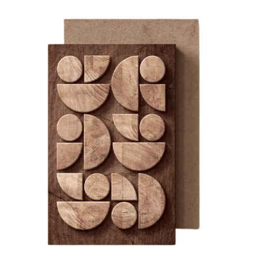 Wooden geometric shapes on a brown card